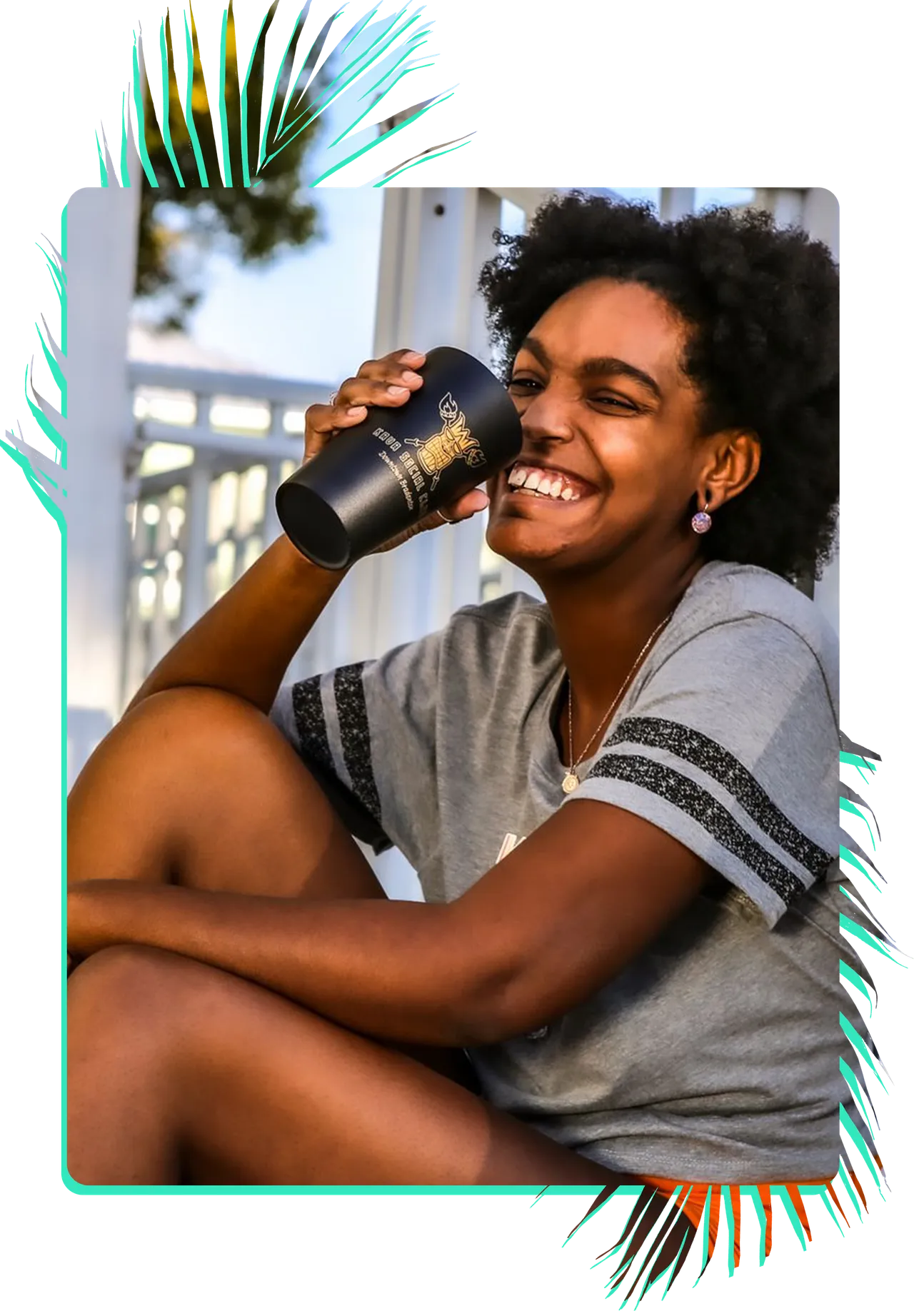 Girl drinking from Kava Social Club cup