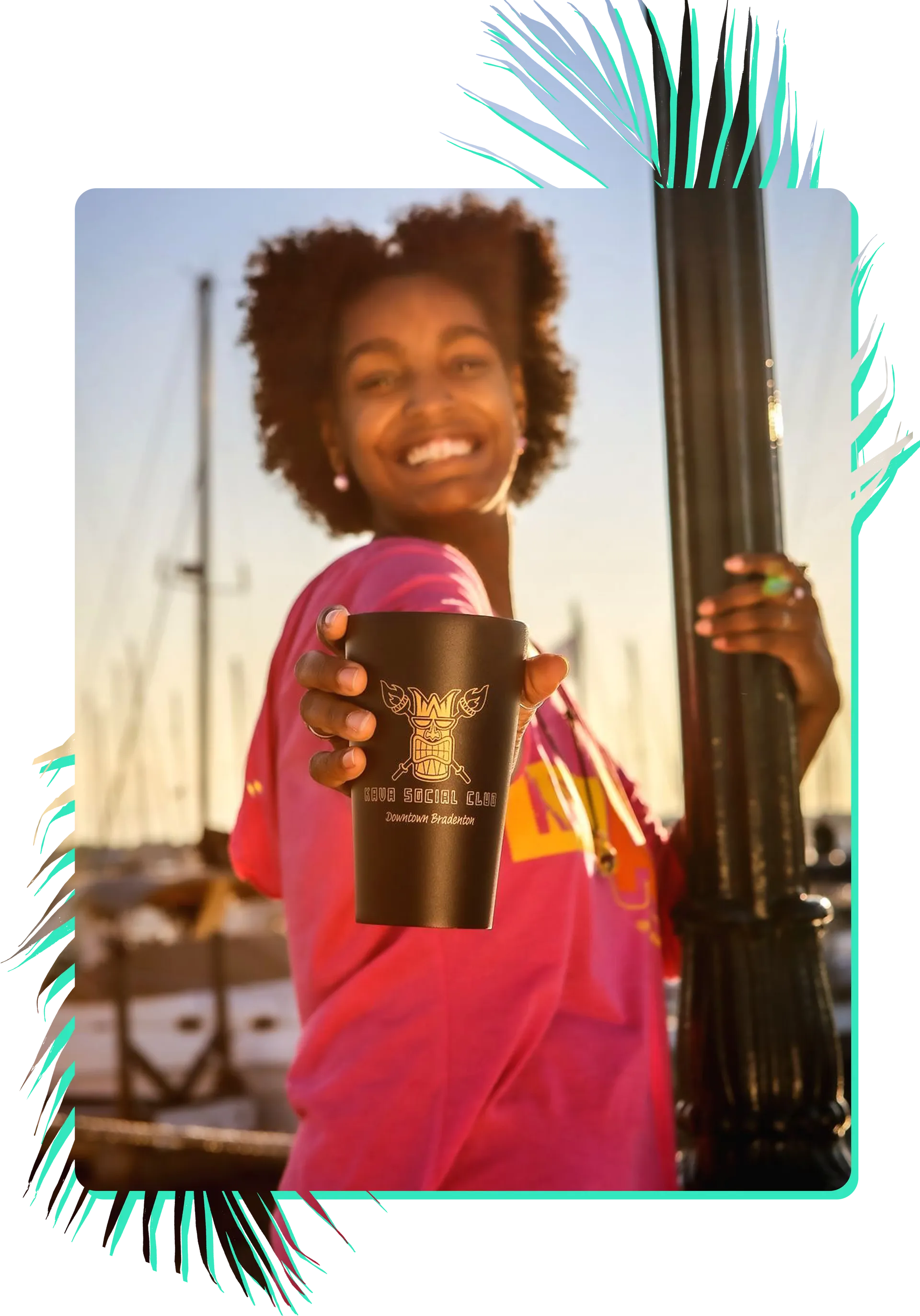 Girl holding Kava Social Club cup